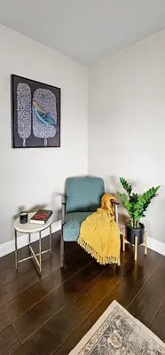 a living room with a green couch and a table at Top Pick Walk to Restaurants, Shops & Near Beach CC C in Los Angeles