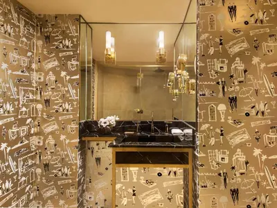 a bathroom with a sink and a mirror at Sunset Tower Hotel in Los Angeles