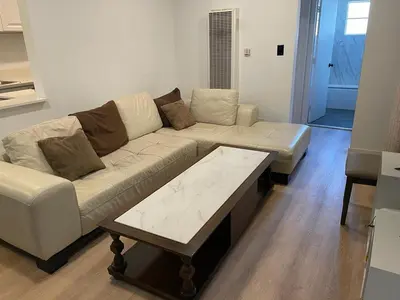 a living room with a couch and a coffee table at Renovateed Two-Bedroom Apartment in Santa Monica in Los Angeles
