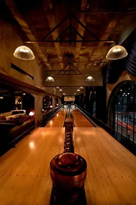 an empty bowling alley with a ball in the middle at The Hollywood Roosevelt in Los Angeles