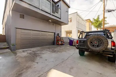 a truck parked in front of a garage at Oceanfront Oasis in Long Beach