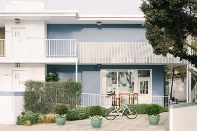 a bike parked in front of a building at Bayside Hotel in Los Angeles