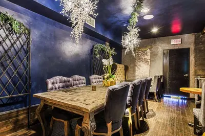 a dining room with a table and chairs at The O Hotel, Trademark Collection by Wyndham in Los Angeles