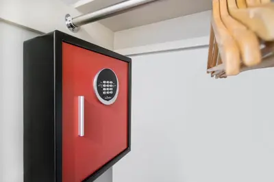 a red door on a wall in a room at Aiden Los Angeles Downtown Dragon Gate Inn in Los Angeles
