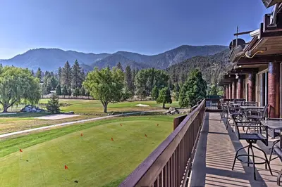 a balcony with a view of a golf course at Star House Unique Home with 360 Mountain Views! in Pine Mountain Club