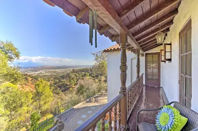 a balcony of a house with a view at The Castle Hacienda Heights Home with Patio and Pool in Hacienda Heights