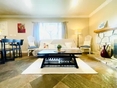 a living room with a couch and a table at GREAT FOR BUSINESS & FAMILY TRIPS 3BD 2BA close to DESNEYLAND, FREE PARKING in Orange