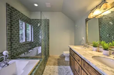 a bathroom with a sink and a shower and a toilet at Incredible Lake Arrowhead Home with Views and Decks! in Lake Arrowhead