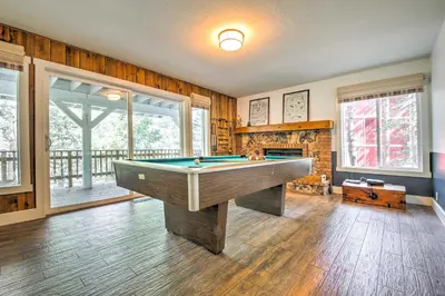 a room with a pool table and a fireplace at Gorgeous Lake Arrowhead Retreat Game Room and Deck in Lake Arrowhead