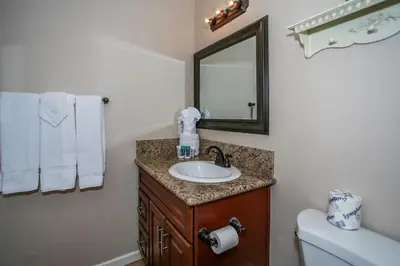 a bathroom with a sink and a mirror at Kitkats Hideaway-1874 by Big Bear Vacations in Big Bear Lake