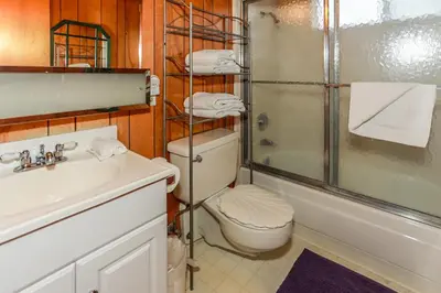 a bathroom with a toilet and a shower and a sink at Makin' Memories At Summit-1683 by Big Bear Vacations in Big Bear Lake