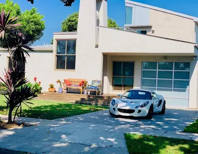 a white car parked in front of a house at Del Rey/Culver City Dream Oasis in Los Angeles
