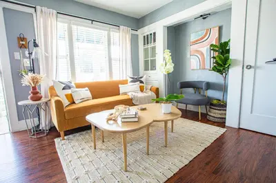 a living room with a couch and a table at Pet-Friendly Stay, Mins to Beach, Conv Ctr, Prkg LB B in Long Beach