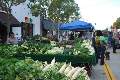 a farmers market with vegetables on display on a street at Stylish Hm Near Beach, Restaurants & Parking CC A in Los Angeles