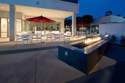 a house with a patio with a fire pit at Staybridge Suites - Long Beach Airport by IHG in Long Beach