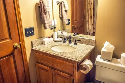 a bathroom with a sink and a toilet at Eagle's Nest in Big Bear Lake