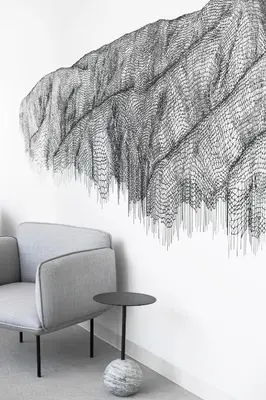 a living room with a couch and a table at AKA West Hollywood in Los Angeles