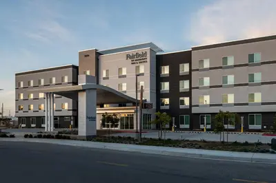 a large building on the side of a street at Fairfield by Marriott Inn & Suites Anaheim Los Alamitos in Los Alamitos