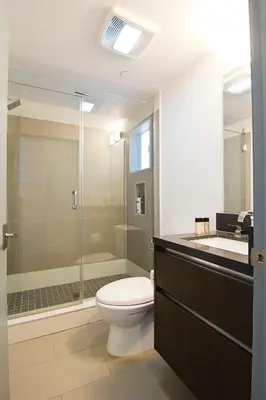 a bathroom with a toilet and a shower and a sink at Hollywood’s Suite in Los Angeles