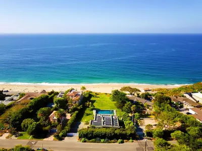 an aerial view of a resort and the ocean at 50 PCT OFF! Malibu Ocean Escape, Pool, Walk to Beach in Malibu