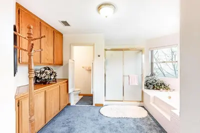 a bathroom with a shower and a sink at The House Of Light and Sky in Lake Arrowhead