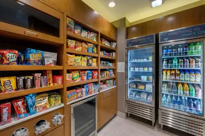 a grocery store aisle with food and drinks at SpringHill Suites by Marriott Anaheim Placentia Fullerton in Placentia