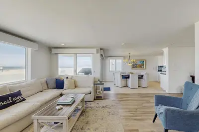 a living room with a couch and a table at Savor the View in Oxnard