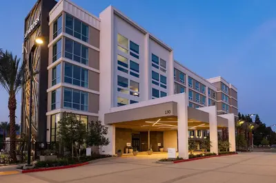 a large white building with a lot of windows at Le Meridien Pasadena Arcadia in Arcadia