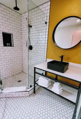 a bathroom with a sink and a shower at The Bell Vista in Burbank