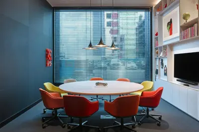 a meeting room with a table and chairs at citizenM Los Angeles Downtown in Los Angeles