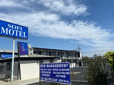 a sign in front of a building with a motel at SOFI MOTEL in Los Angeles