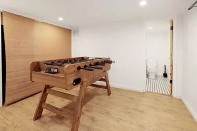 a room with a wooden table in a room at Conklin Paradise #1993 by Big Bear Vacations in Big Bear Lake