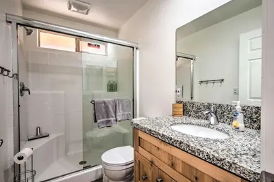 a bathroom with a sink and a shower and a toilet at Pine Mountain Club Villa with Sauna, Deck and Views! in Pine Mountain Club