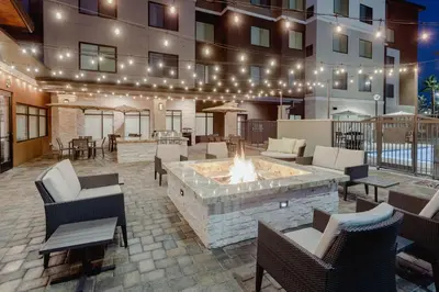 a patio with a fire pit in front of a building at Residence Inn by Marriott Loma Linda Redlands in Redlands