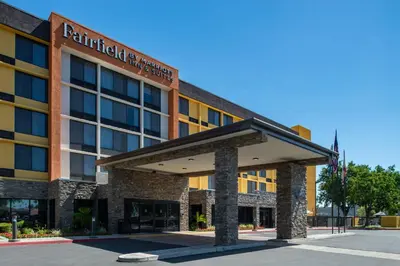 a hotel with a sign on the front of it at Fairfield Inn and Suites by Marriott Bakersfield Central in Bakersfield
