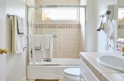 a bathroom with a toilet and a sink at Hollywood Hills Homestay in Los Angeles