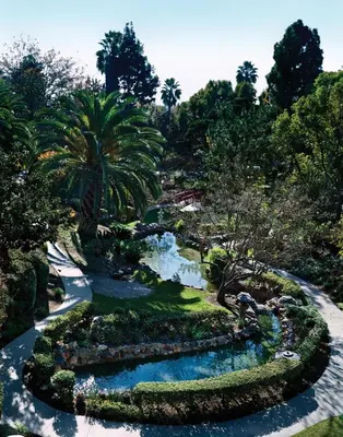 an aerial view of a garden with a river at The Langham Huntington, Pasadena in Pasadena