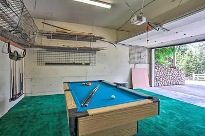 a pool table in a room with a pool at Ornate Lake Arrowhead Home with Deck in Lake Arrowhead