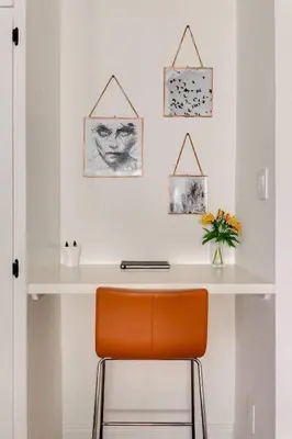 a white desk with an orange chair in a room at Sophisticated Long Beach Suite with Patio Dining and Parking NRP21-00185 in Long Beach