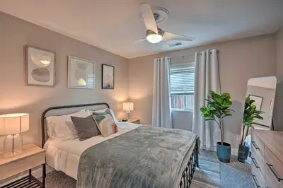 a bedroom with a bed and a ceiling fan at Family-Friendly Home, 6 Mi to Riverwalk Plaza in Bakersfield