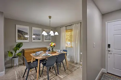 a dining room with a table and chairs at Family-Friendly Home, 6 Mi to Riverwalk Plaza in Bakersfield
