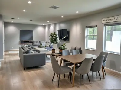 a living room with a table and a couch at Hollywood Homes Free parking close to all things LA in Los Angeles