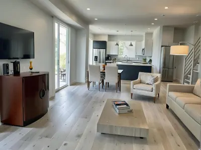 a living room with a couch and a table at Hollywood Homes Free parking close to all things LA in Los Angeles