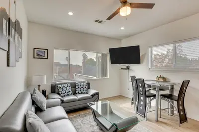 a living room with a couch and a table at 5 Mi to Universal Studios Family Gem with Hot Tub! in Burbank