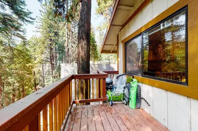 a stroller parked on a deck of a house at Morrison Manor in Lake Arrowhead