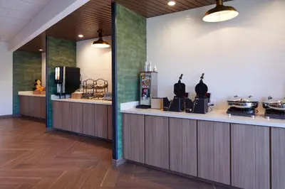 a kitchen with a counter with pots and pans at Fairfield by Marriott Inn & Suites Palmdale West in Palmdale