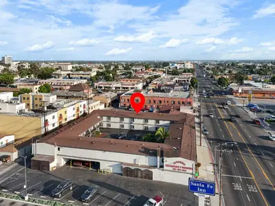 an aerial view of a city with a red sign at Santa Fe Inn Los Angeles in Huntington Park