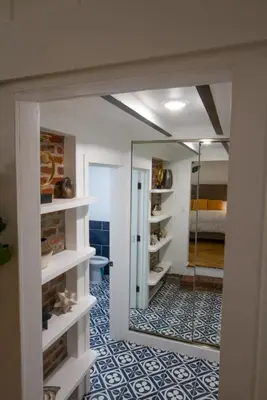 a room with a mirror and a room with a bedroom at Dreamy Farmhouse in Studio City in Los Angeles