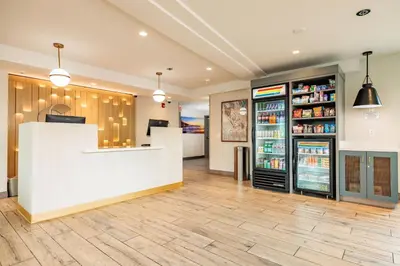 a store with a counter and a refrigerator at Comfort Inn & Suites Ventura Beach in Ventura