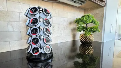 a wall with a bunch of plates on it at Sky-Rise Apartments in Los Angeles